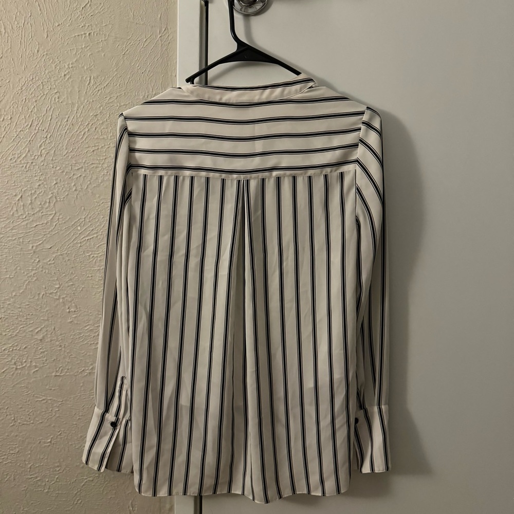 Black and white stripped blouse.